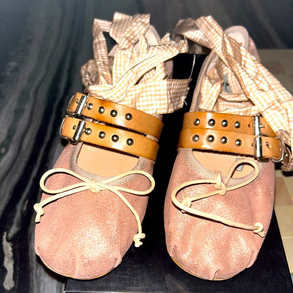 Divine folly loaded up ballet shoes like MIU MIU